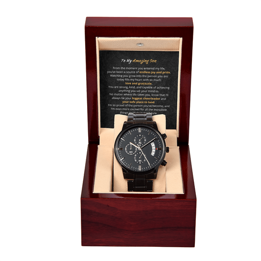 Black ShineOn Fulfillment chronograph on a watch with metal band displayed in a wooden gift box