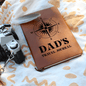 Leather journal travel for dad with compass design and vintage camera on patterned cloth