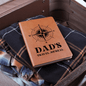 Someone Said Gift leather journal travel for dad with compass design placed on clothes inside an open suitcase