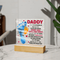 Someone Said Gift acrylic plaque with Father's Day message and colorful baby footprints on wooden stand
