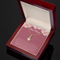 Gold teardrop pendant necklace in wooden gift box with Dear Mom floral card alluring beauty necklace with message card