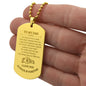 Gift for Dad Dog Tag Necklace in gold with engraved loving message held in hand from Someone Said Gift