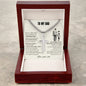 Gift for Dad Necklace in silver with cross pendant displayed in wooden box with sentimental message