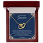 Gift for Grandmother Necklace with intertwined hearts in gold displayed in a wooden gift box