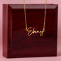 Gift for Her Signature Name Necklace in gold with custom script on chain displayed on wooden box