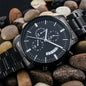 Gift for Husband Chronograph Watch by ShineOn Fulfillment with black dial and metal band on stones