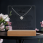 Gift for Mom Necklace Acrylic LED with silver pendant on a wooden base display by ShineOn Fulfillment