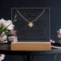 Gift for Mom Necklace Acrylic LED with gold heart pendant displayed on wooden base by ShineOn Fulfillment