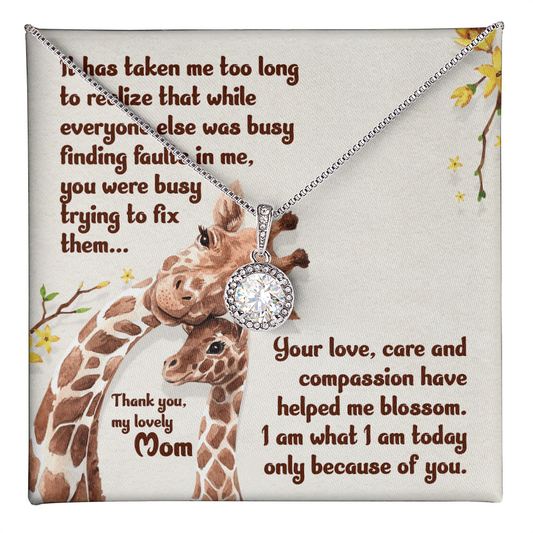 Gift for Mom Necklace with sparkling pendant on chain displayed on a giraffe-themed message card