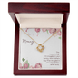 Gift for Mom Necklace with a gold floral pendant displayed in a wooden gift box with a Mother's Day message