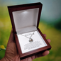 Gift for Mom Necklace in a wooden jewelry box with a message card for mama to be