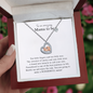 Gift for Mom Necklace by Someone Said Gift featuring heart pendant with baby feet in a gift box