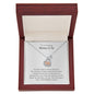 Gift for Mom Necklace with heart and baby feet charm in a wooden gift box by Someone Said Gift