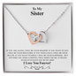 Gift for Sister Necklace with two interlocking hearts in silver and rose gold on a message card