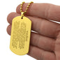 Gift for Son Dog Tag Necklace gold tone with engraved inspirational message held in hand