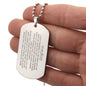 Gift for Son Dog Tag Necklace with engraved inspirational message held in hand