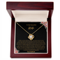 Gift for wife Love Knot Necklace in gold with a sparkling stone displayed in a wooden gift box