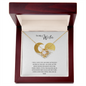 Gift for wife Love Knot Necklace in gold with a sparkling center stone in a wooden gift box