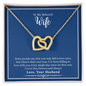 Gift for Wife Necklace with two interlocking gold hearts on a chain in a blue box with a loving message