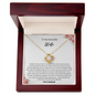 Gold heart-shaped necklace with a sparkling stone in a wooden box gift for wife on christmas