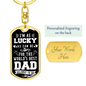 Gold dog tag keychain with I’m as lucky as can be for the world’s best dad text gift idea for a dad