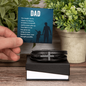 Someone Said Gift black leather bracelet with silver cross on box and gift idea for a dad card