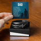 Leather and braided bracelet with cross on black box gift idea for a dad by Someone Said Gift
