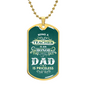 Gold dog tag necklace with green background and teacher dad quote gift idea for a dad