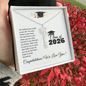 Graduation Cap Name Necklace by Someone Said Gift displayed in a box with inspirational message and Class of 2026 text