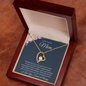 Gold heart pendant necklace with crystal center on chain in wooden gift box with floral card to my amazing mom necklace