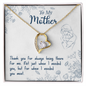 Gold heart pendant necklace with crystal accents on gift card reading To My Mother personalized forever love necklace