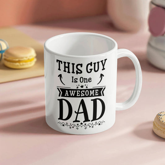 White mug with black text this guy is one awesome dad gift idea for a dad from Someone Said Gift