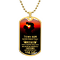 Gold necklace dog tag with loving message from dad to son and sunset silhouette design