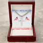 Silver necklace and cross with American flag design engraved, patriotic gift in wooden box