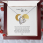 Heart-shaped necklace with a sparkling pendant in a gift box, perfect gift for wife