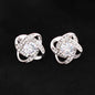 Someone Said Gift silver stud earrings with crystal accents in elegant swirl design