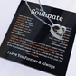 Silver heart-shaped necklace for gold with a small crystal pendant on a soulmate message card