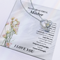You turn a house into a home necklace with heart pendant on silver chain displayed on a gratitude message card